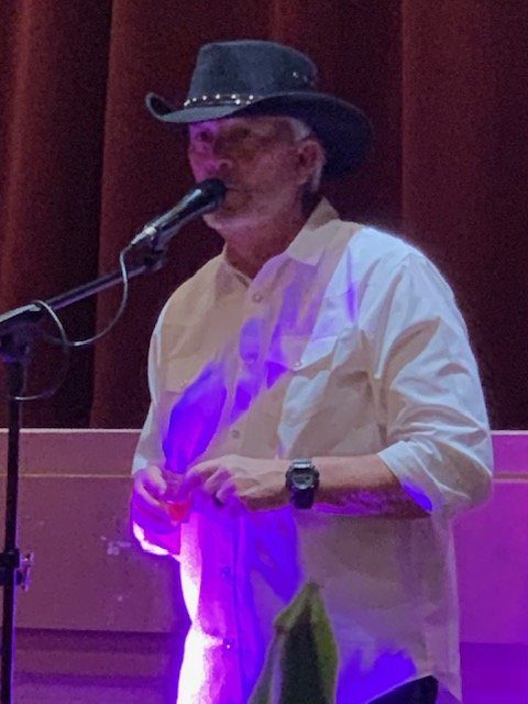 Rick Simpson singing at a local Kingman event