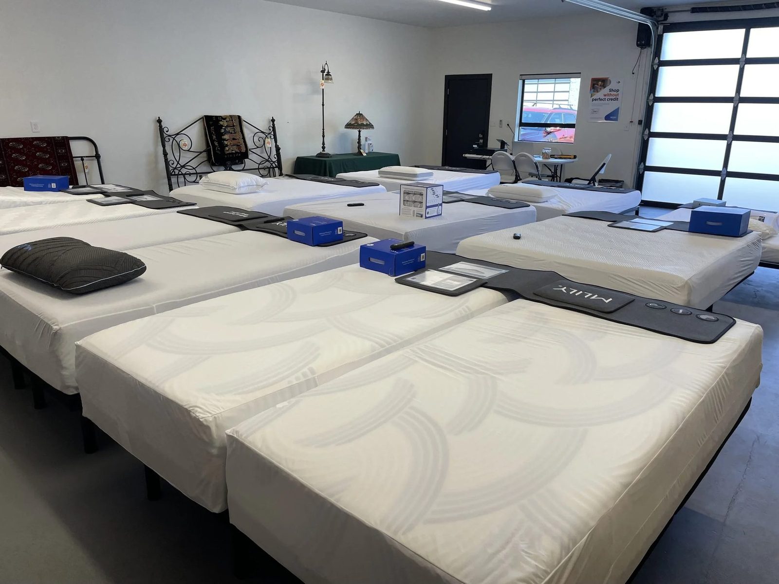 Rick’s Route 66 Sleep & Home Center showroom — MLily mattresses on display in the Kingman warehouse